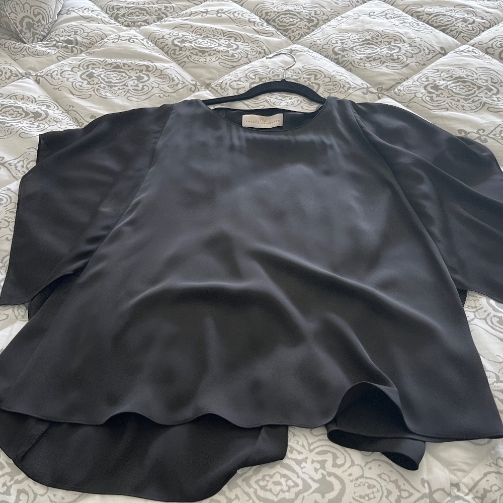 Amanda uprichard black top open in the back